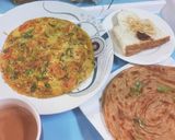 A picture of step 6 of Simple Omelet with Lacha Paratha n Tea.