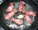 Foto del passaggio 4 della ricetta Calamari ripieni al sugo