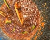 A picture of step 3 of Rendang daging babi.
