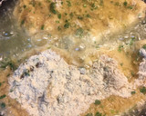 Foto del paso 5 de la receta: Pollo empanado con ajo y rúcula