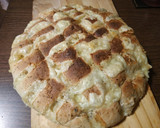 Foto del paso 4 de la receta: Pan de ajo relleno con queso