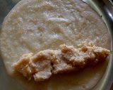 A picture of step 8 of Kheer'r Patishapta pithe (a traditional Bengali sweet delicacy).