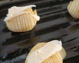 A picture of step 3 of Oven Roasted Potatoes with Cheese.