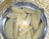 A picture of step 4 of Potato Masala Wedges.