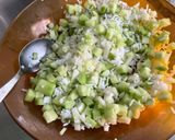 Une image de l'étape 10 de Salade de riz aux deux tomates, concombre et coriandre.