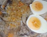 A picture of step 6 of Rice Porridge with Button Mushrooms.