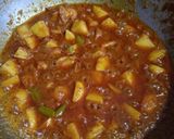 A picture of step 8 of Aloo Pulao.