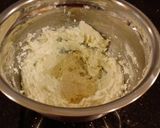 A picture of step 4 of Toasted Coconut Thumbprint Cookies.