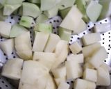 A picture of step 1 of Green papaya with black chana and potatoes.