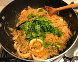 A picture of step 9 of Mixed seafood fried rice noodles.
