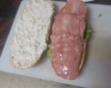 Foto del paso 5 de la receta: Bocadillo de pechuga empanada con bacon y mayonesa de cebolla y piparras