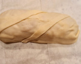 Foto del paso 4 de la receta: Solomillo en hojaldre con panceta, queso y piquillos