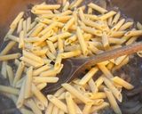 Foto del passaggio 3 della ricetta Penne con Funghi e Platessa