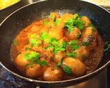 A picture of step 1 of Khatte Laal Masala Aloo.