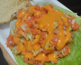 Foto del paso 6 de la receta: Sándwich con muchos vegetales y pollo🥙🥯🧅🍆🍗🥪