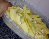 Foto del paso 4 de la receta: Papas al horno PASADAS POR HARINA