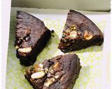 A picture of step 3 of Eggless coffee & nuts plum cake in microwave.