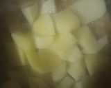 A picture of step 5 of Sey bhajhhi (fish + veg).