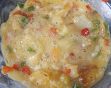 Foto del paso 3 de la receta: Tortilla de patata, cebolla, pimiento rojo y verde