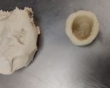 A picture of step 2 of Kaju chocolate cups.