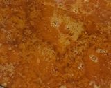 A picture of step 5 of Turai chhilka kofta with curry.