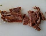 Foto del passaggio 1 della ricetta Pomodori cuore di bue con stracchino e acciughe