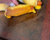A picture of step 9 of Pigs in a Blanket.