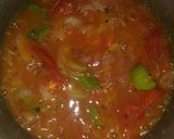 A picture of step 9 of Besni masala prahta with tomato souce.