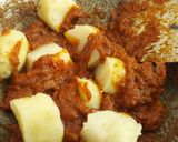 A picture of step 11 of AlOO BESAN TARAKARI.