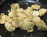 A picture of step 3 of Golden Salted Egg Dumplings (Salted Egg Stir-Fried Dumplings).