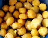 A picture of step 3 of Sweet punugulu (Urad dal sweet balls).