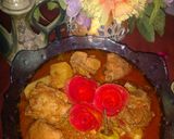 A picture of step 6 of Aloo chicken.