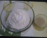 A picture of step 1 of Spinach Alfredo pizza (homemade base).