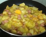 Foto del paso 9 de la receta Sartén de patatas, huevos y salchichas con queso mozarella