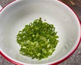 A picture of step 3 of Pork Chops with Zesty Green Onion Salsa.