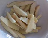 A picture of step 1 of Sweet and spicy potato wedges.