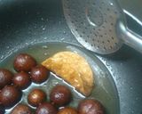 A picture of step 22 of Warm gulab jamun in sweet crunchy tacos.