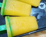 A picture of step 4 of Orange popsicles.