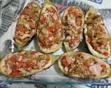 Foto del paso 4 de la receta: Berenjenas rellenas con un toque navideño 🎄