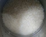 A picture of step 1 of Choliya Pulao.