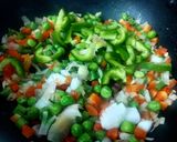 A picture of step 3 of Singapore Egg Fried Rice.