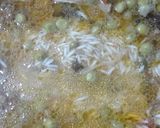 A picture of step 6 of Matar Pulao.