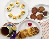 A picture of step 5 of Devilled eggs, Japanese Pancakes, Smiley potato Pakora.