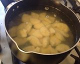 A picture of step 5 of Gnocchi with basil pesto.