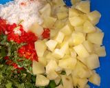 A picture of step 7 of Dambu shinkafa with veg.sauce.
