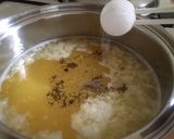 A picture of step 3 of Oriental egg-drop sweet corn soup.