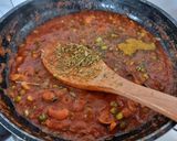 A picture of step 5 of Cashew matar masala.