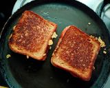 A picture of step 2 of Cheese and Tomato Grilled Sandwich.