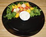 A picture of step 4 of Beer-Battered Fried Shrimp with Mango and Goat Cheese Salad.