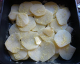 Foto del paso 2 de la receta: Pescado con milhojas de papas en microondas 